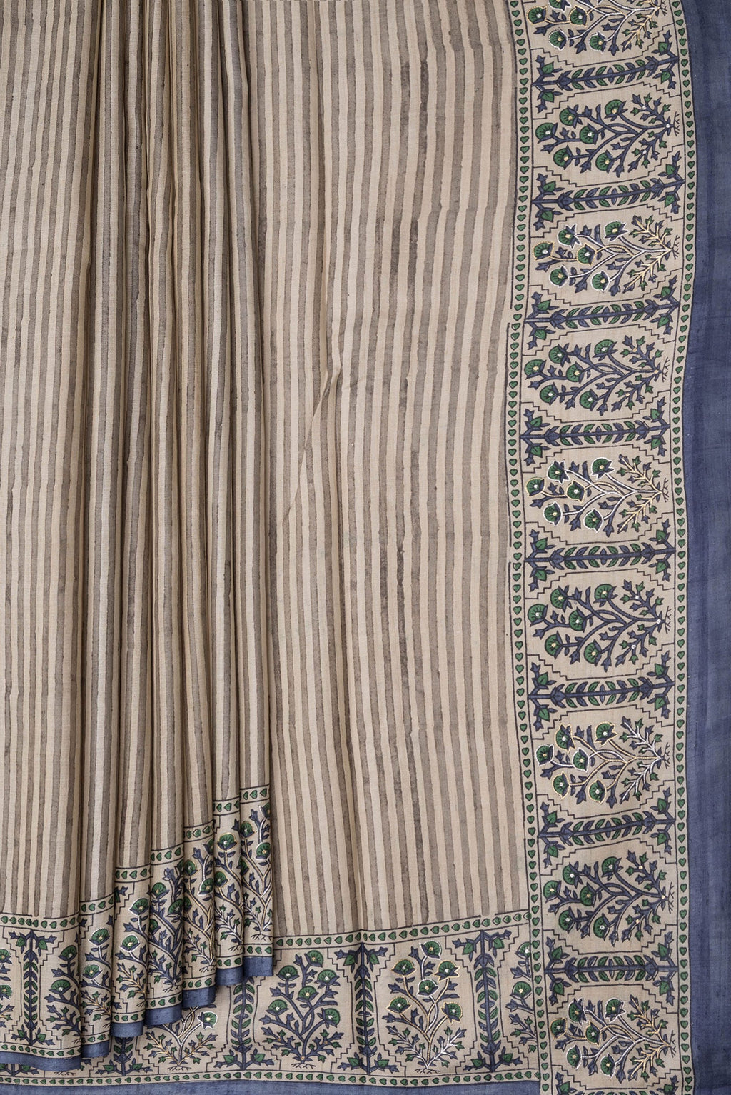 Pleats and pallu of Beige Dual Tone Tussar Silk Saree with Stripes on the body and Embroidery Border. 