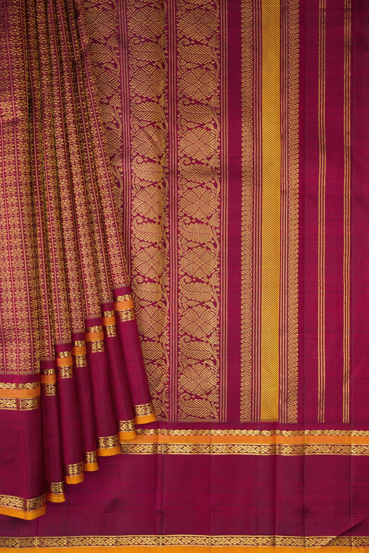 Pleats and pallu of Burgundy Dual Tone Kanchipuram Silk Saree with Zari Brocade on the body and Zari Border. 