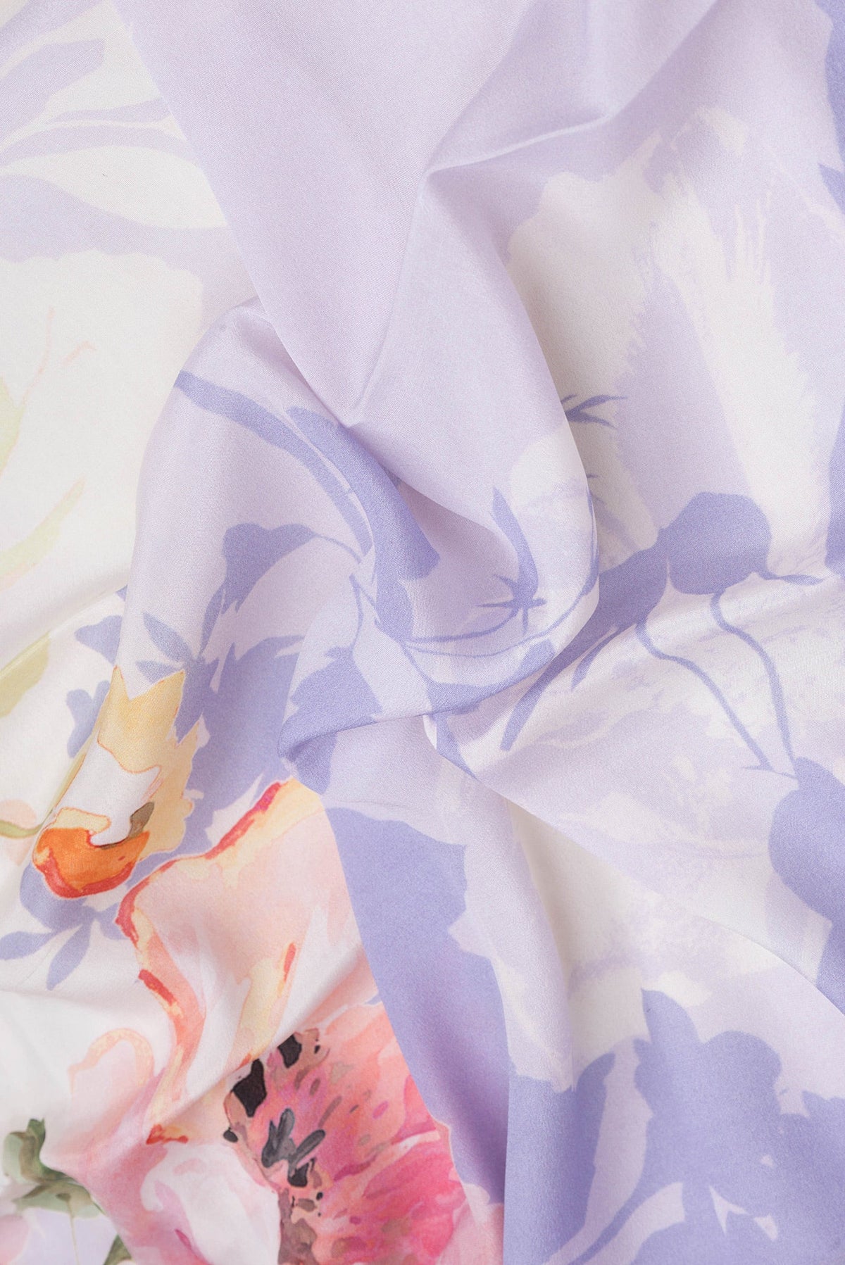 Close up of Lavender Dual Tone Mysore Crepe Saree with Printed design on the body and Zari Border.  displaying folds