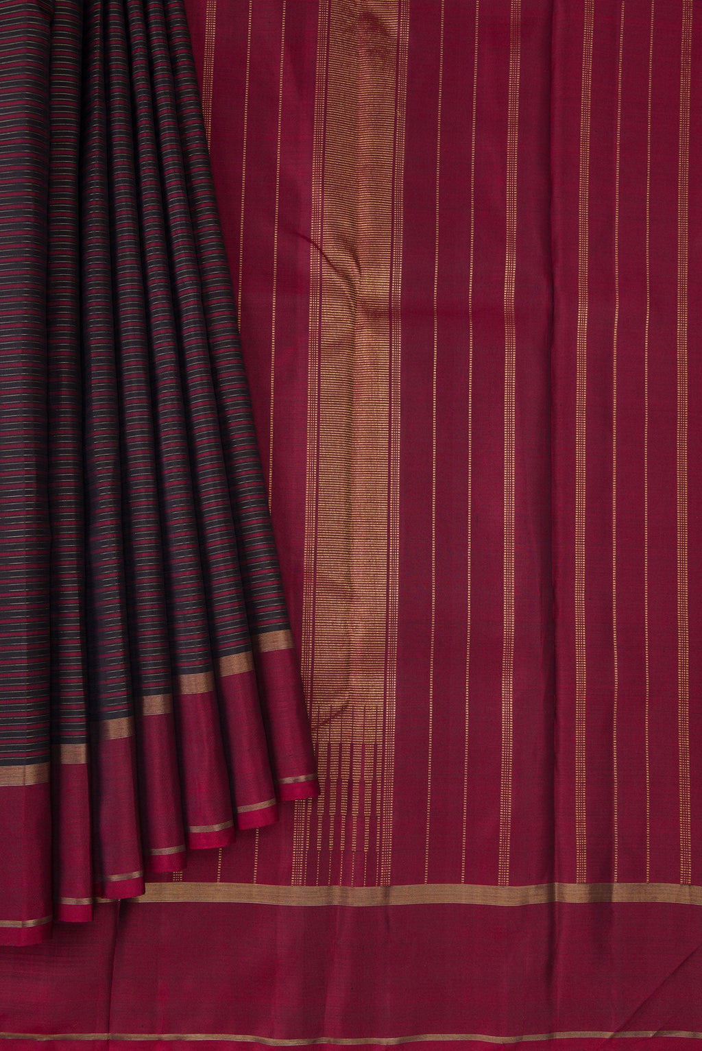 Pleats and pallu of Pure Silk Pure Zari Burgundy Dual Tone Kanchipuram Saree with Stripes on the body and Zari Border. 