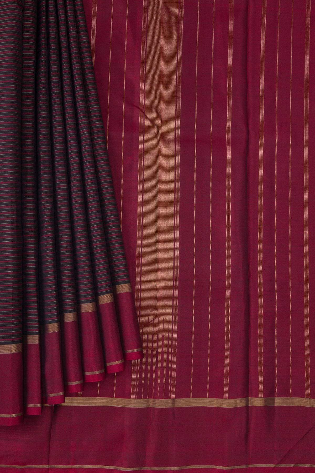 Pleats and pallu of Pure Silk Pure Zari Burgundy Dual Tone Kanchipuram Saree with Stripes on the body and Zari Border. 