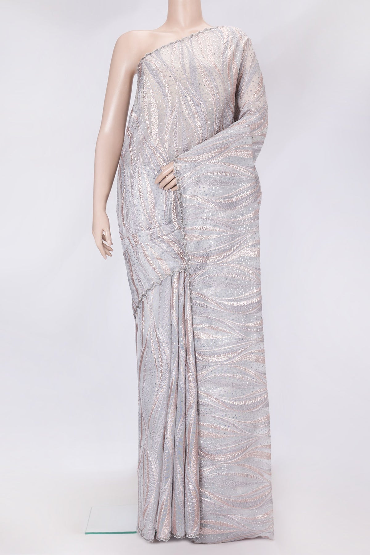 Grey Dual Tone Organza Silk Saree with Embroidery on the body and Embroidery Border.  displayed on a mannequin