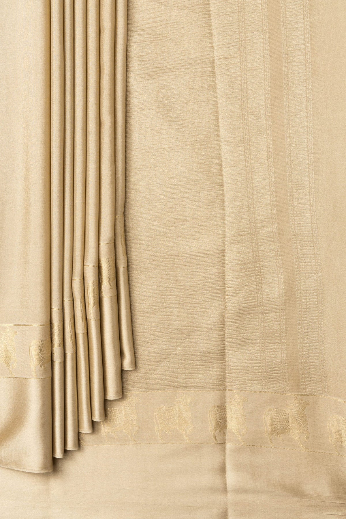 Pleats and pallu of Beige Dual Tone Mysore Silk Saree with Plain Body and Fancy Border. 