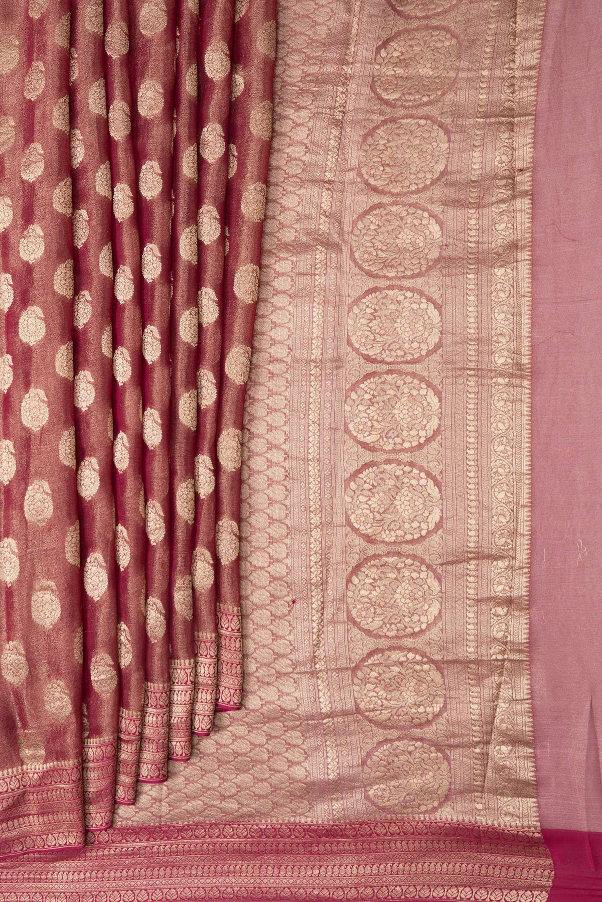 Pleats and pallu of Pink Dual Tone Mysore Georgette Saree with Zari Brocade on the body and Zari Border. 