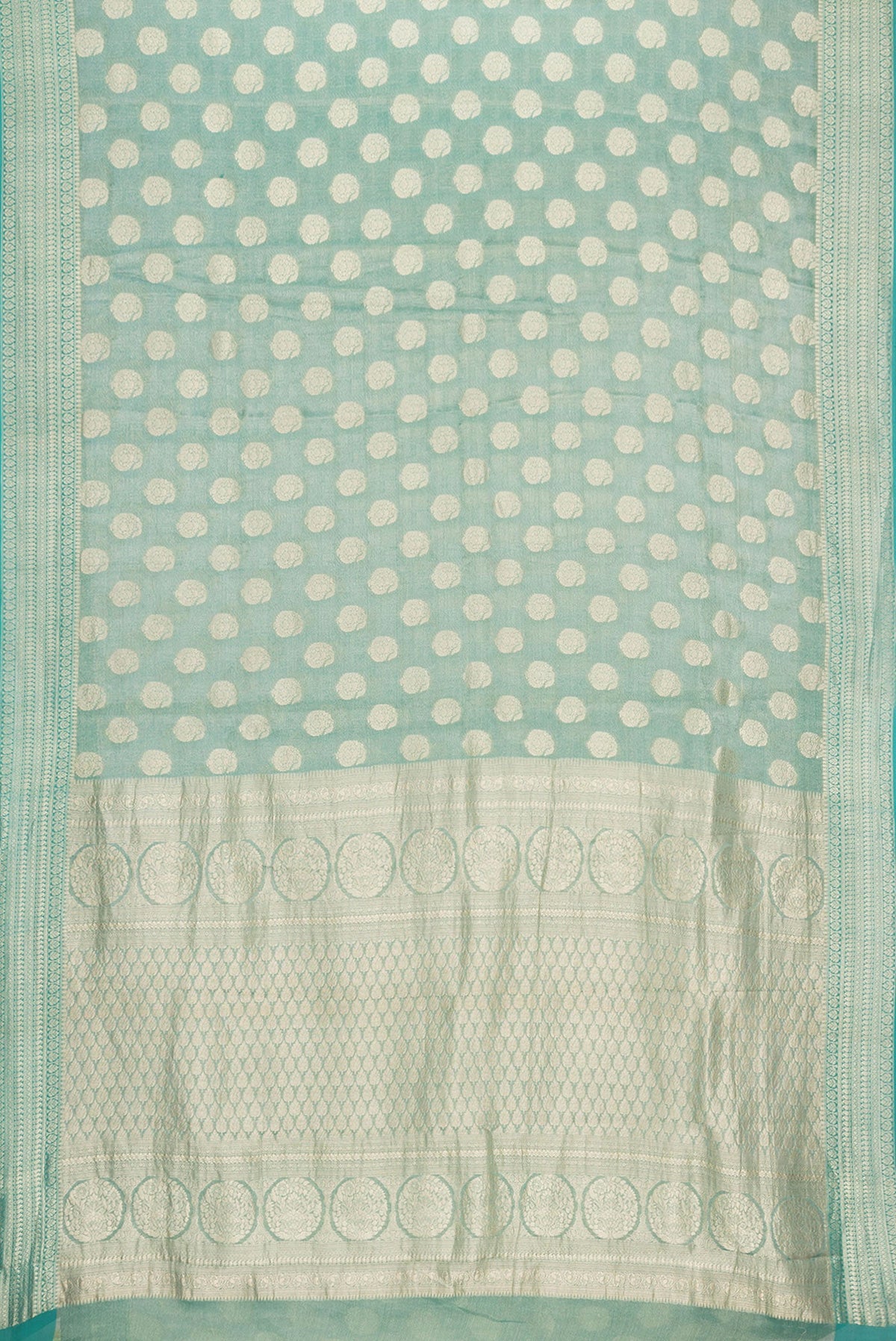 Flat view of Sea Green Dual Tone Mysore Georgette Saree with Zari Brocade on the body and Zari Border. 