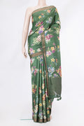 Olive Green Tussar Silk Saree with Floral Print on the body and Zari Border.  displayed on a mannequin