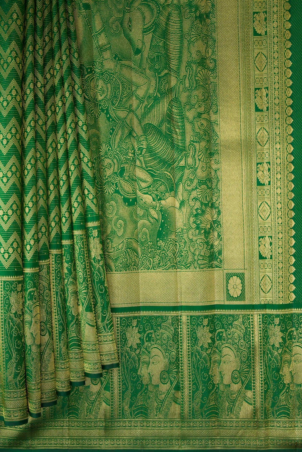 Pleats and pallu of Green Dual Tone Kanchipuram Silk Saree with Zari Brocade on the body and Fancy Border. 