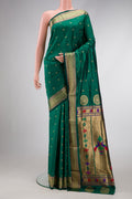 Green Dual Tone Blended Paithani Silk Saree with Zari Butta on the body and Zari Border.  displayed on a mannequin