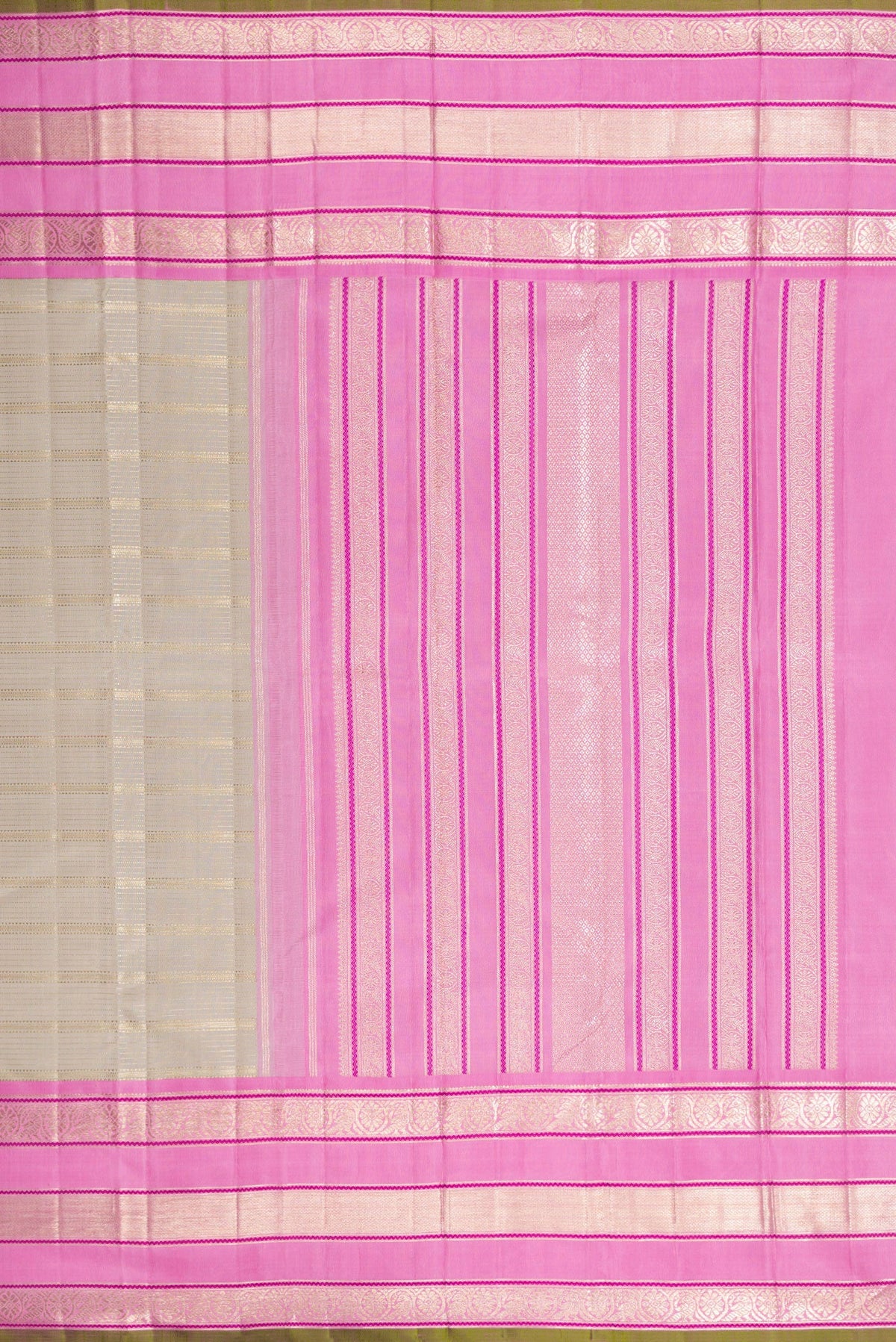 Close up image of the pallu of Grey Dual Tone Kanchipuram Silk Saree with Zari Brocade on the body and Zari Border. 