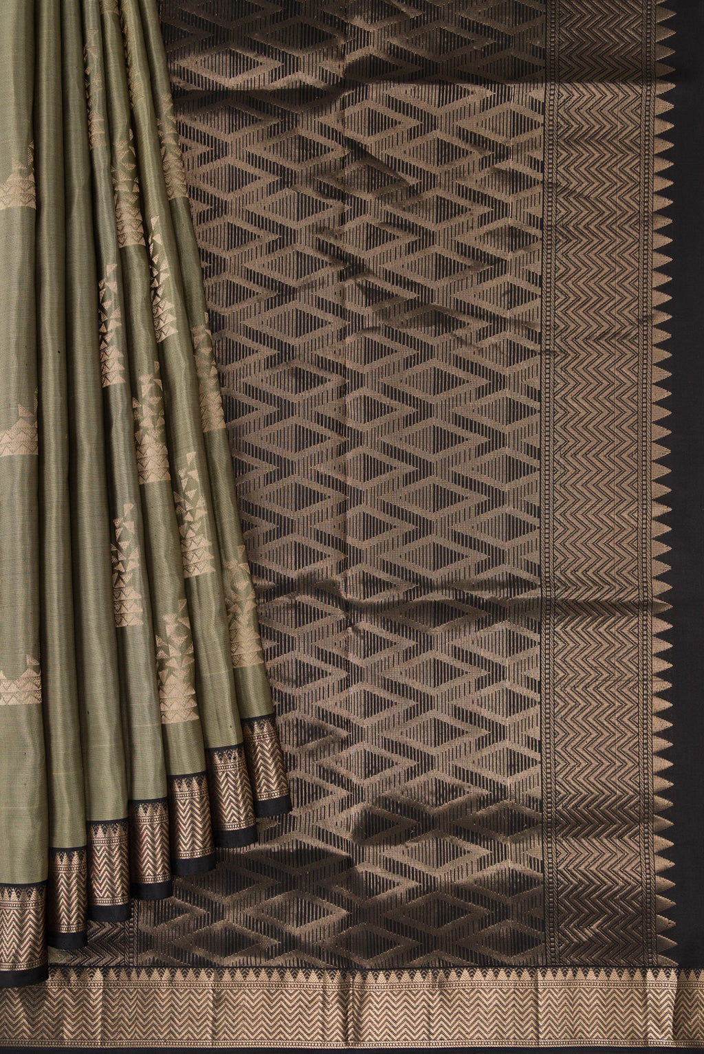Pleats and pallu of Grey Dual Tone Soft Silk Saree with Zari Butta on the body and Zari Border. 