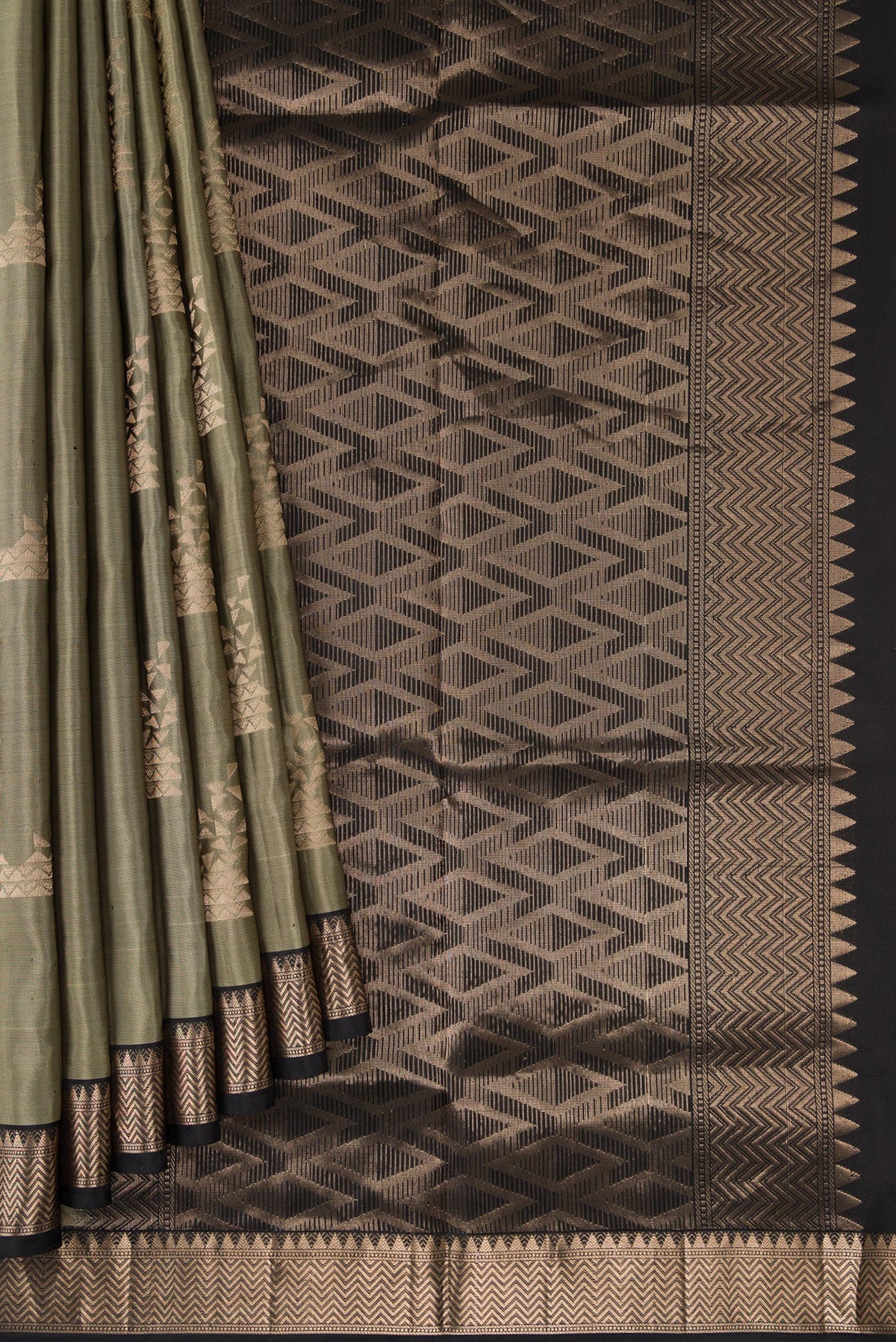 Pleats and pallu of Grey Dual Tone Soft Silk Saree with Zari Butta on the body and Zari Border. 
