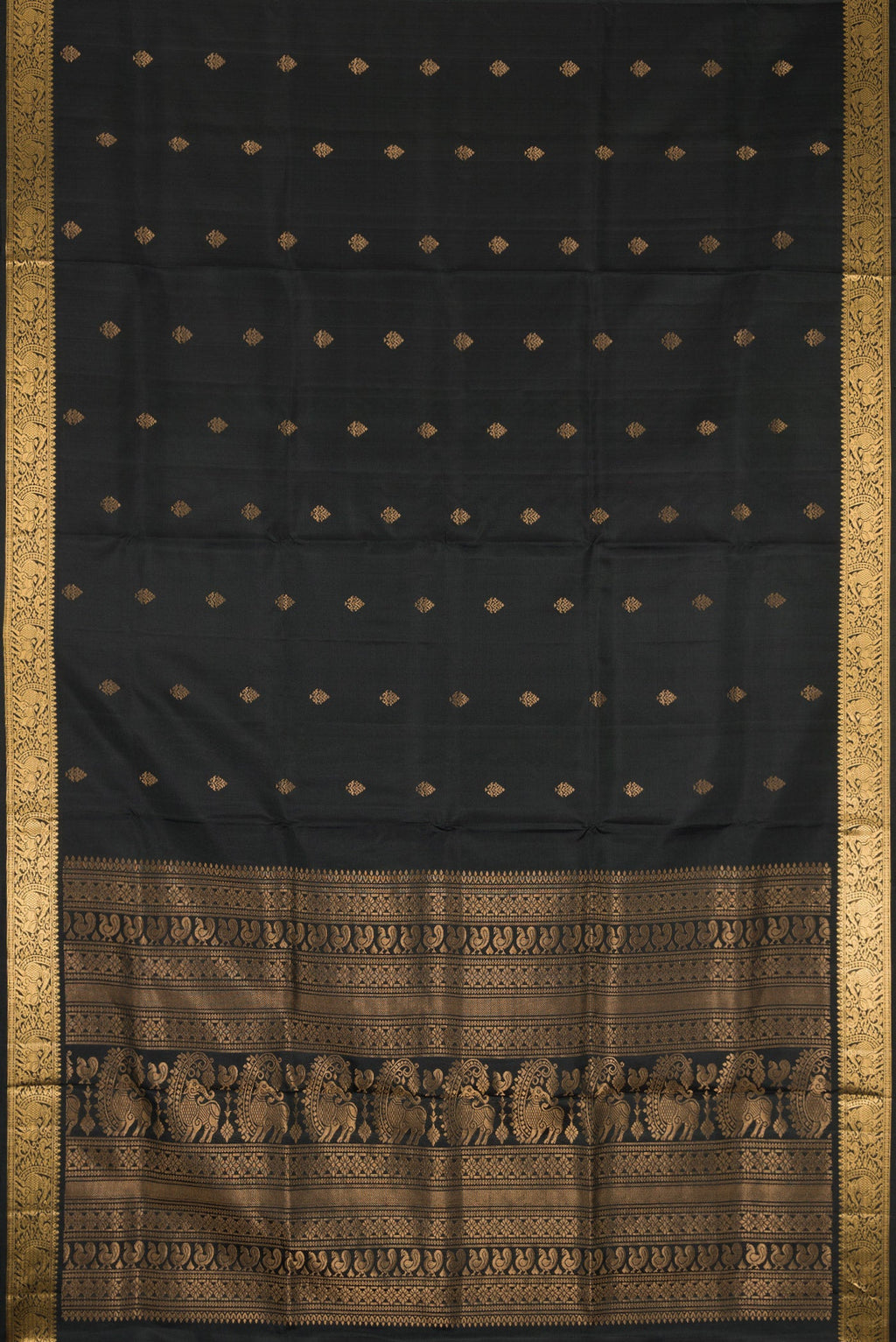 Flat view of Black Dual Tone Soft Silk Saree with Zari Butta on the body and Zari Border. 