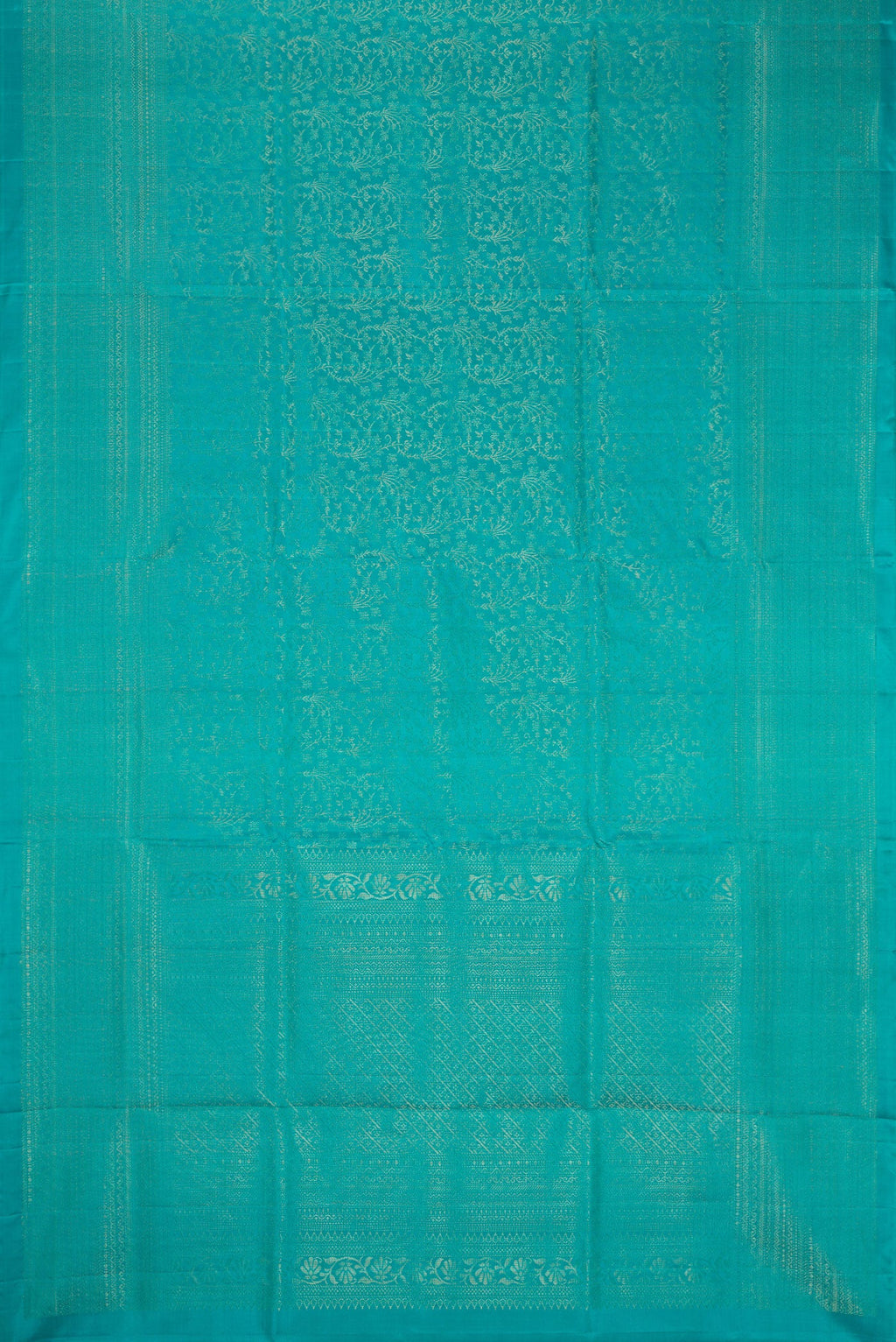 Flat view of Sky Blue Dual Tone Soft Silk Saree with Zari Brocade on the body and Zari Border. 