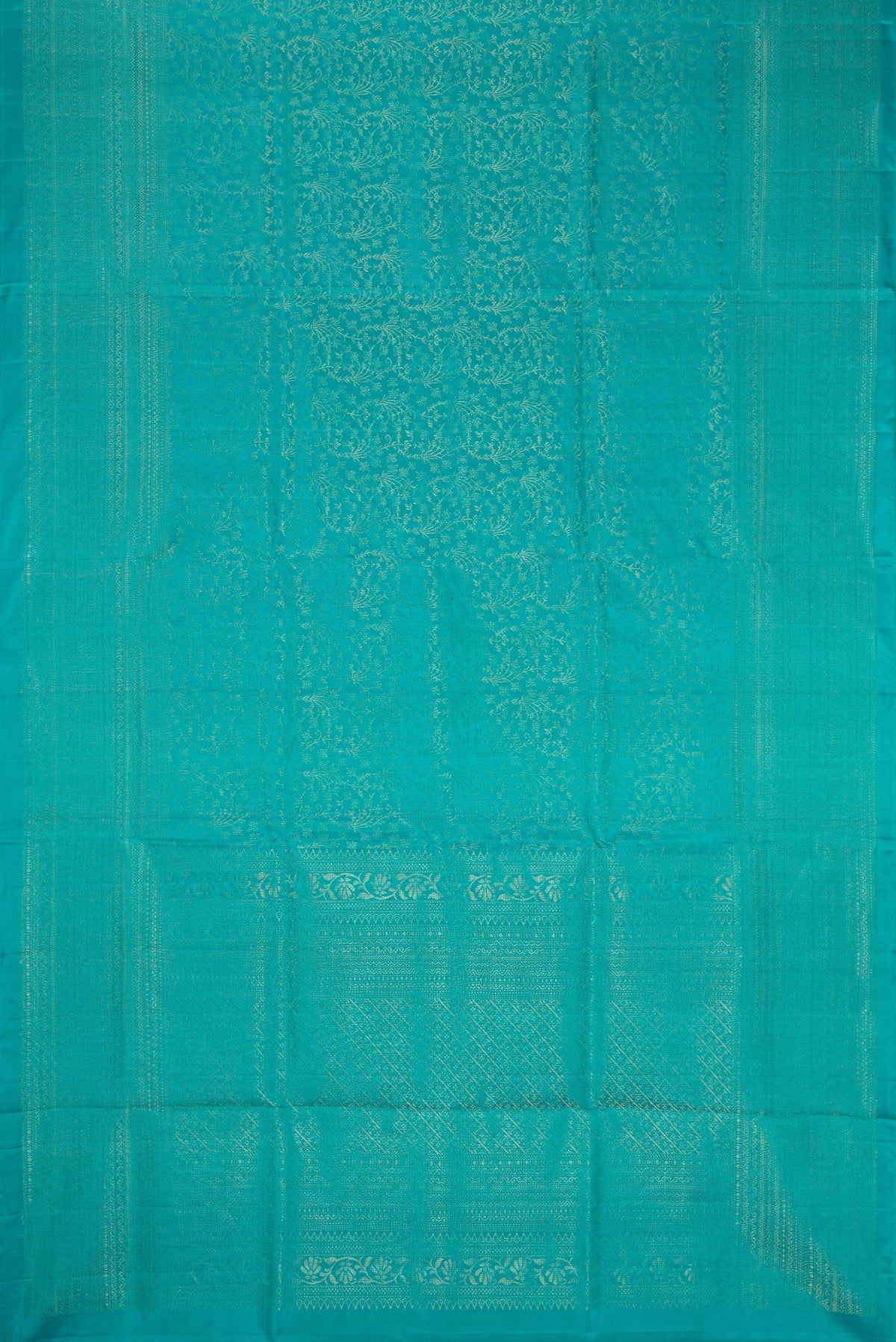 Flat view of Sky Blue Dual Tone Soft Silk Saree with Zari Brocade on the body and Zari Border. 