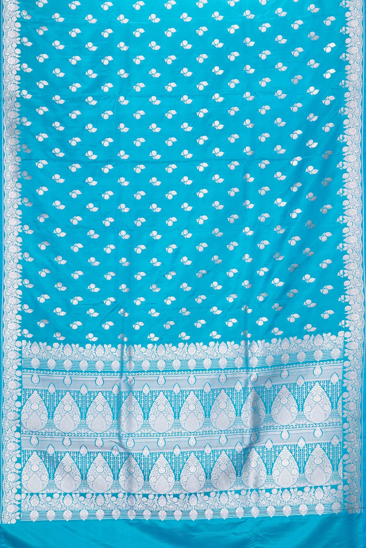 Flat view of Sky Blue Dual Tone Blended Banarasi Silk Saree with Zari Butta on the body and Zari Border. 