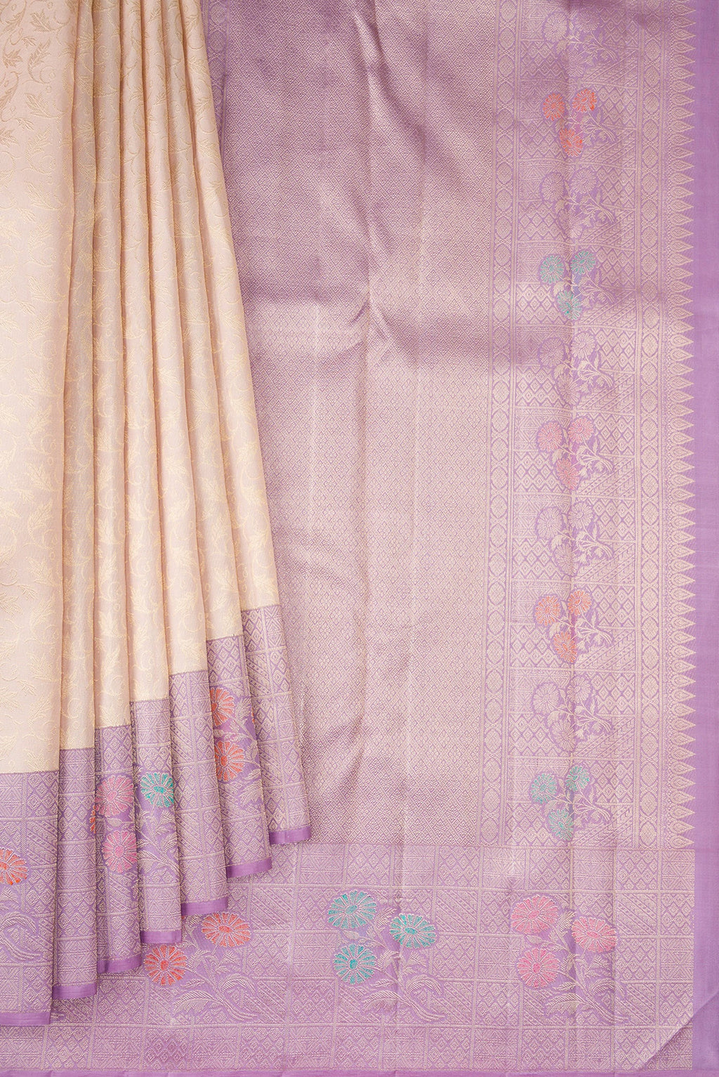 Pleats and pallu of Golden Peach Dual Tone Kanchipuram Silk Saree with Zari Brocade on the body and Fancy Border. 