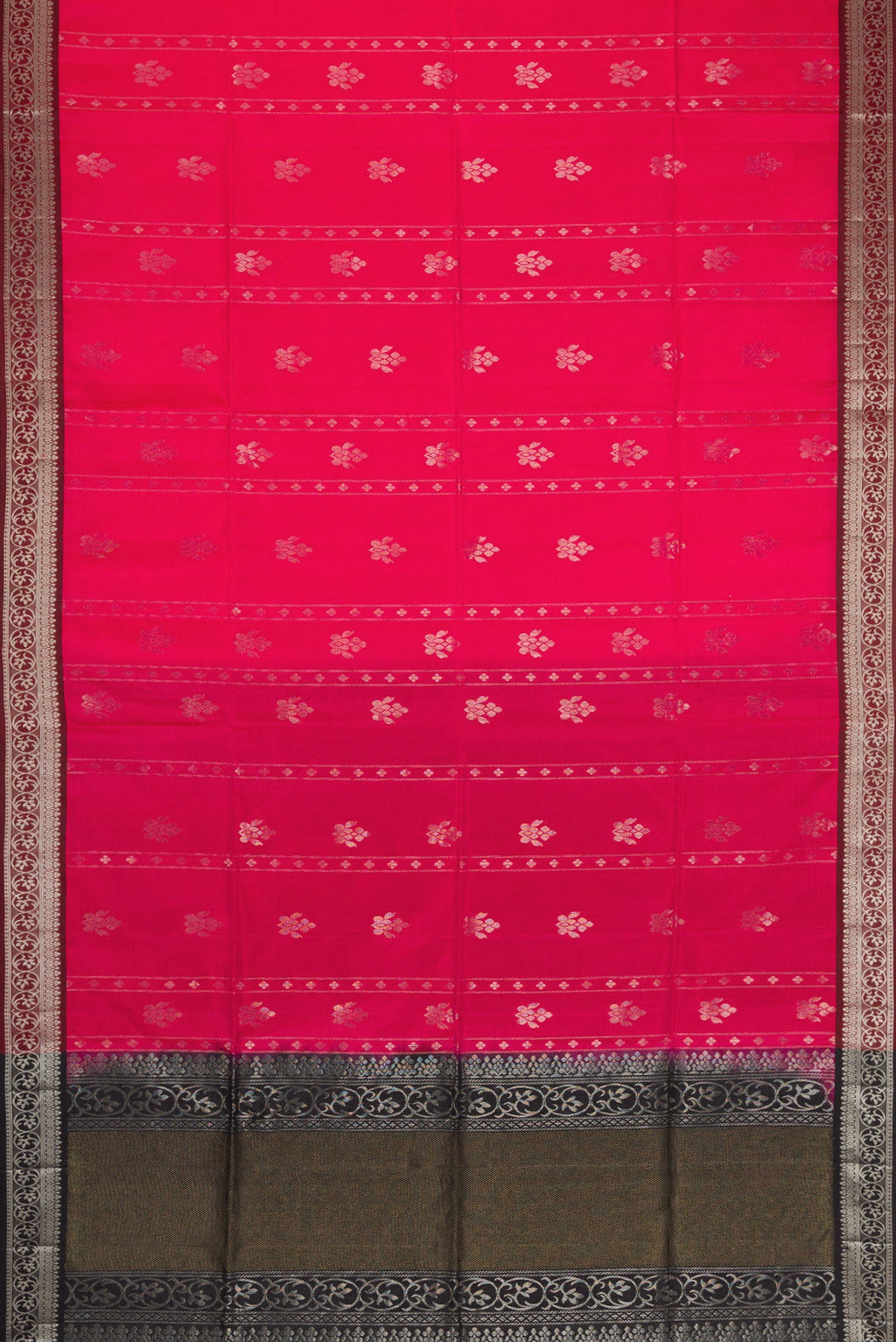 Flat view of Pink Soft Silk Saree with Zari Butta on the body and Zari Border. 
