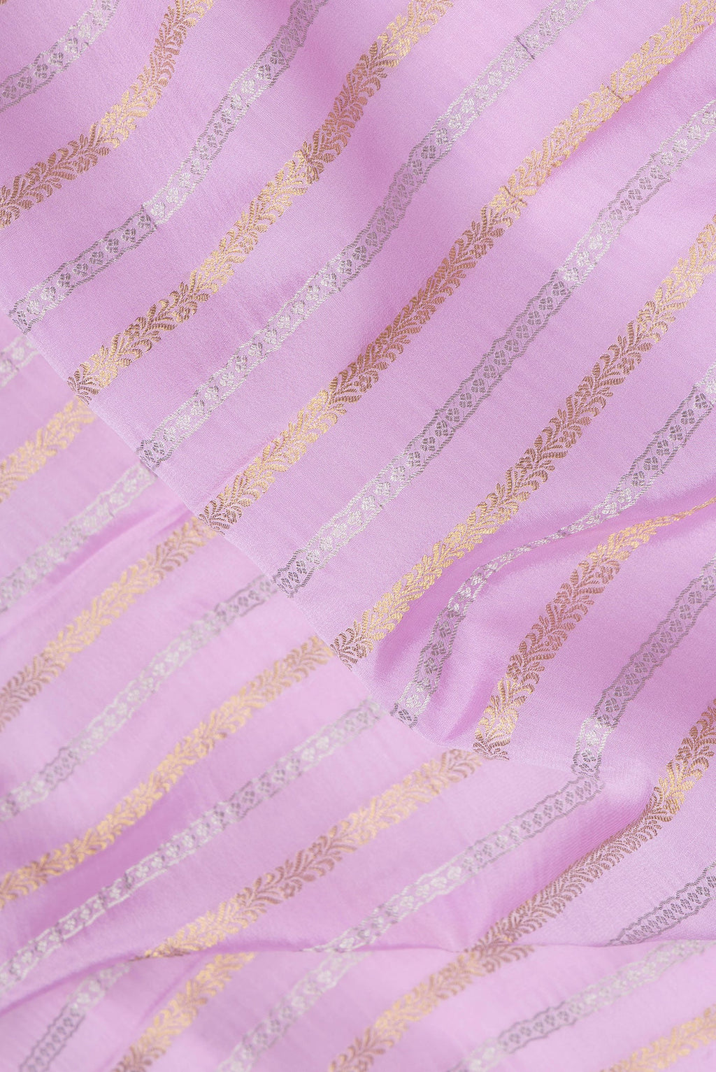 Close up of Pink Dual Tone Mysore Silk Saree with Stripes on the body and Zari Border.  displaying folds