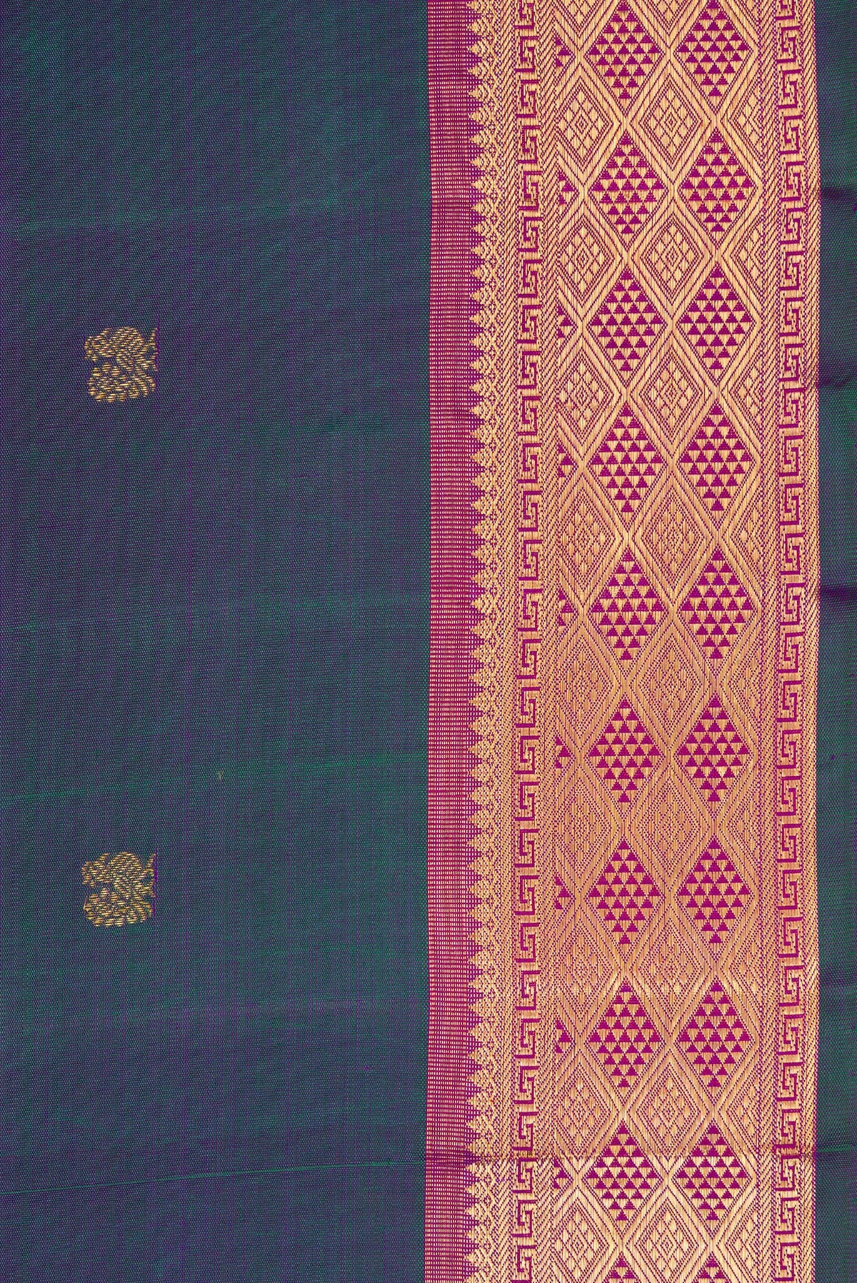 Border image of Peacock Blue Dual Tone Kanchipuram Silk Saree with Zari Butta on the body and Zari Border. 