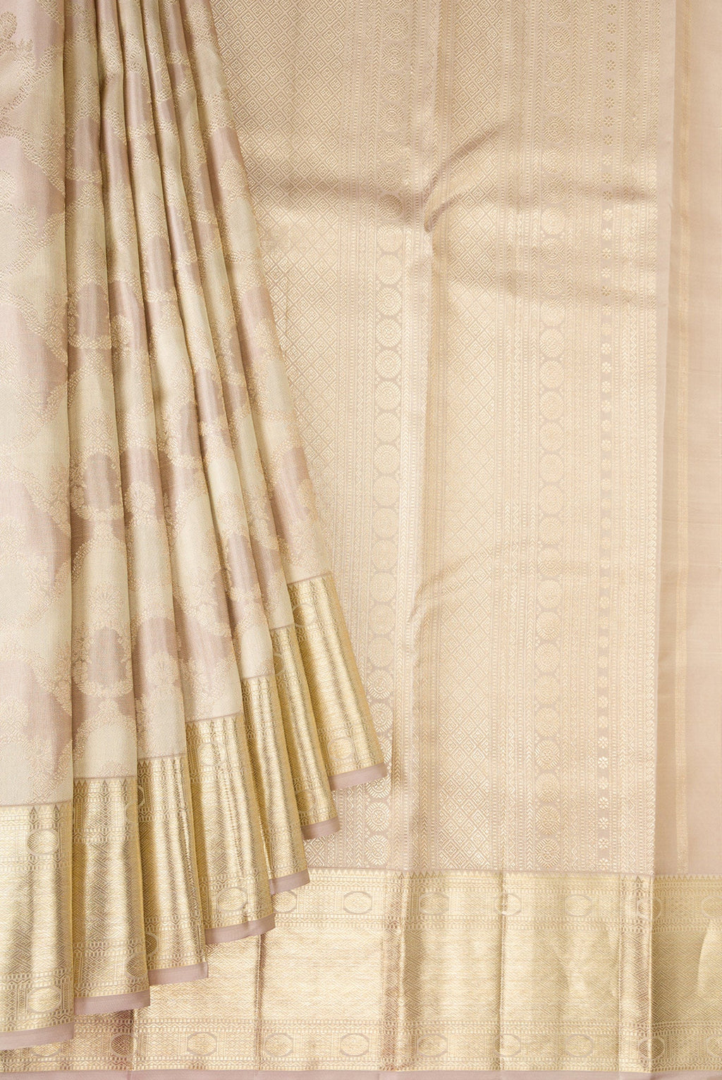 Pleats and pallu of Rose Gold Dual Tone Kanjivaram Silk Saree with Zari Brocade on the body and Zari Border. 