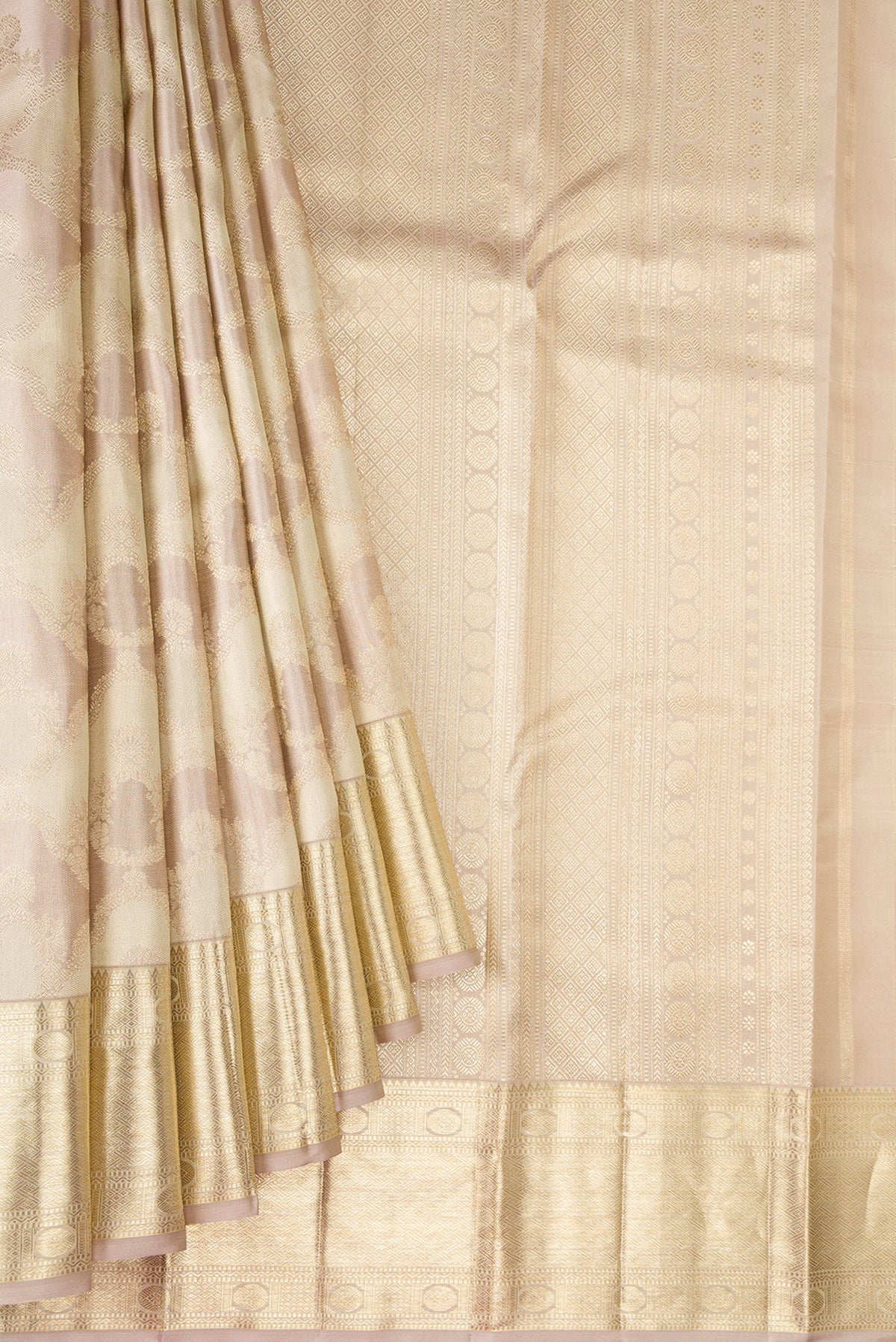 Pleats and pallu of Rose Gold Dual Tone Kanjivaram Silk Saree with Zari Brocade on the body and Zari Border. 