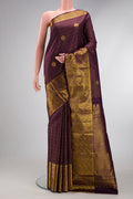 Burgundy Dual Tone Kanjivaram Silk Saree with Stripes on the body and Zari Border.  displayed on a mannequin