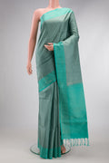 Grey Soft Silk Saree with Stripes on the body and Zari Border.  displayed on a mannequin