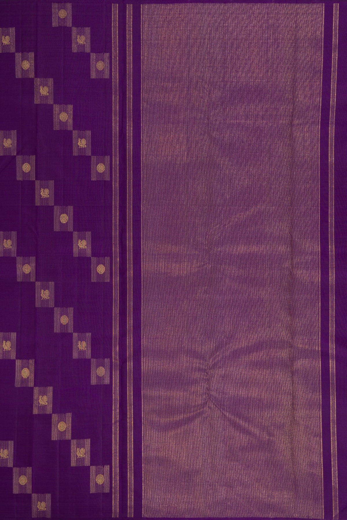 Close up image of the pallu of Pure Silk Pure Zari Violet Kanjivaram Saree with Zari Butta on the body and Without Border. 