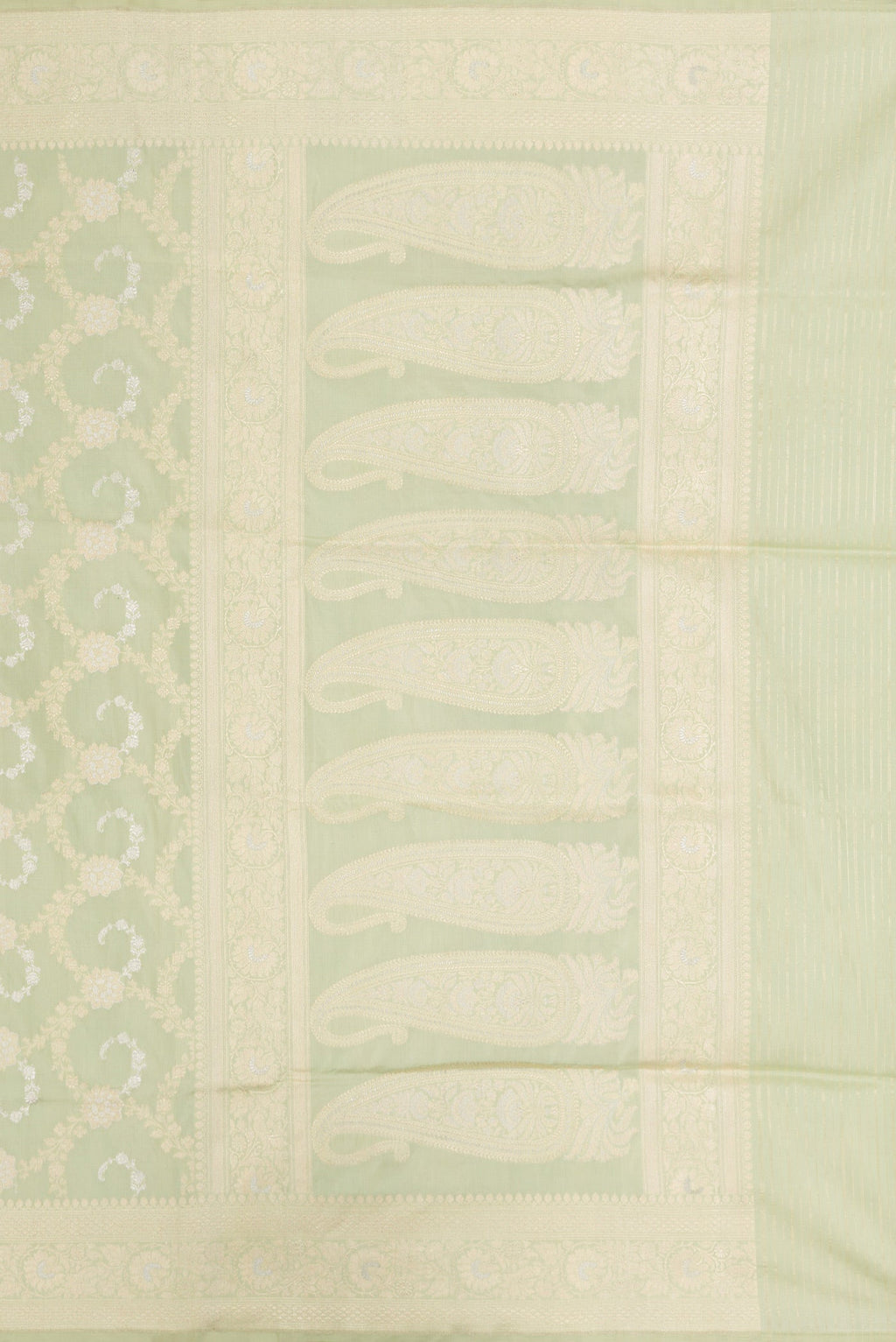 Close up image of the pallu of Pista Green Dual Tone Banarasi Silk Saree with Zari Brocade on the body and Zari Border. 