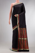 Black Banarasi Silk Saree with Plain Body and Zari Border.  displayed on a mannequin