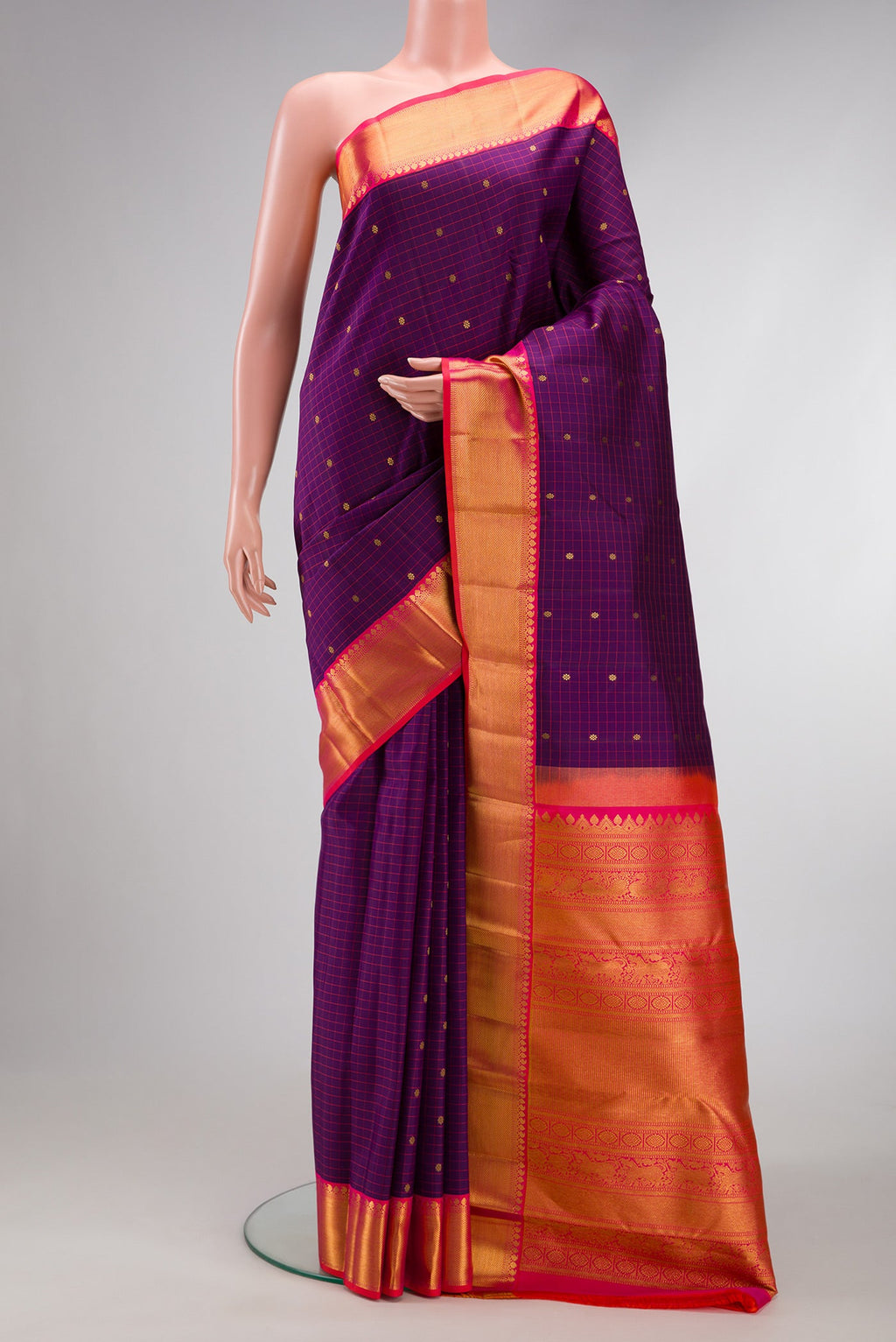 Purple Dual Tone Kanjivaram Silk Saree with Checked design on the body and Zari Border.  displayed on a mannequin