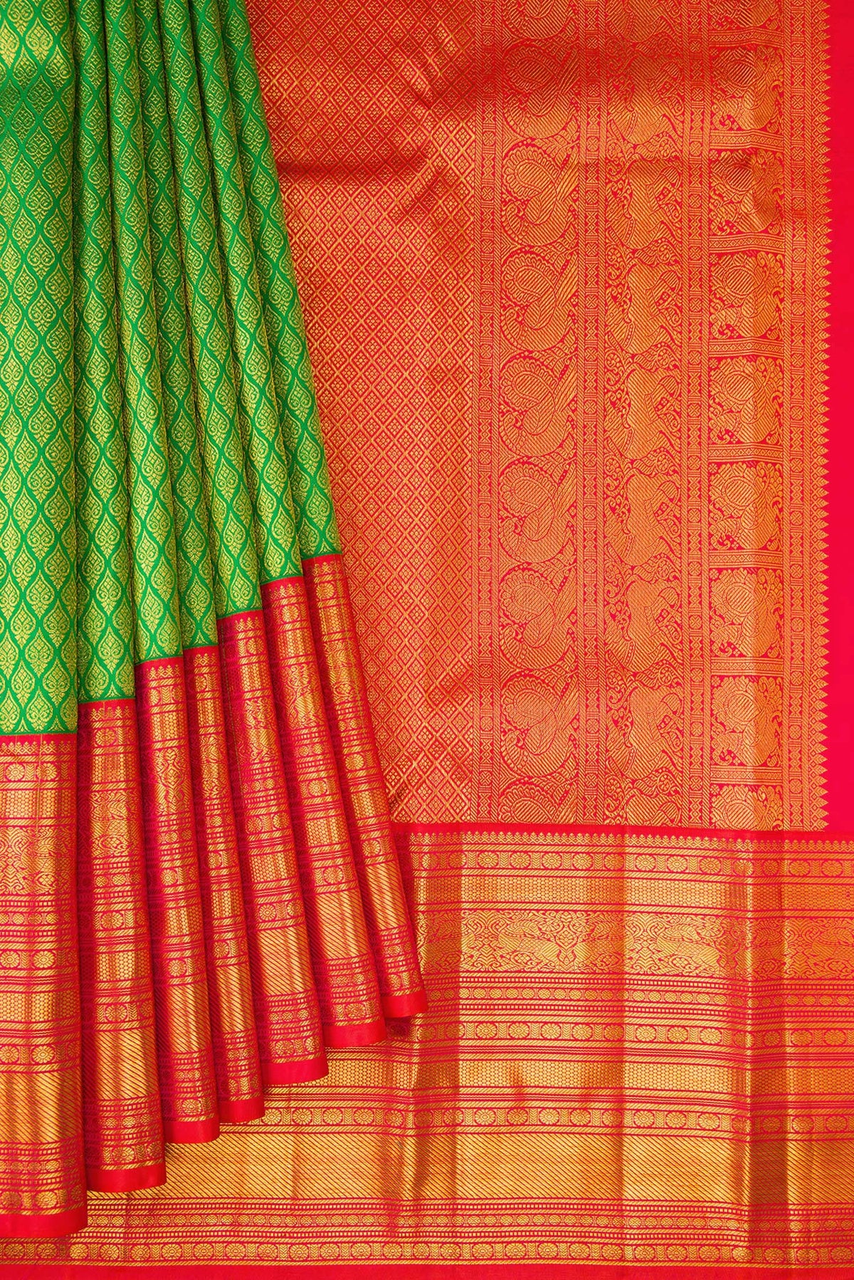 Pleats and pallu of Green Kanjivaram Silk Saree with Zari Brocade on the body and Zari Border. 