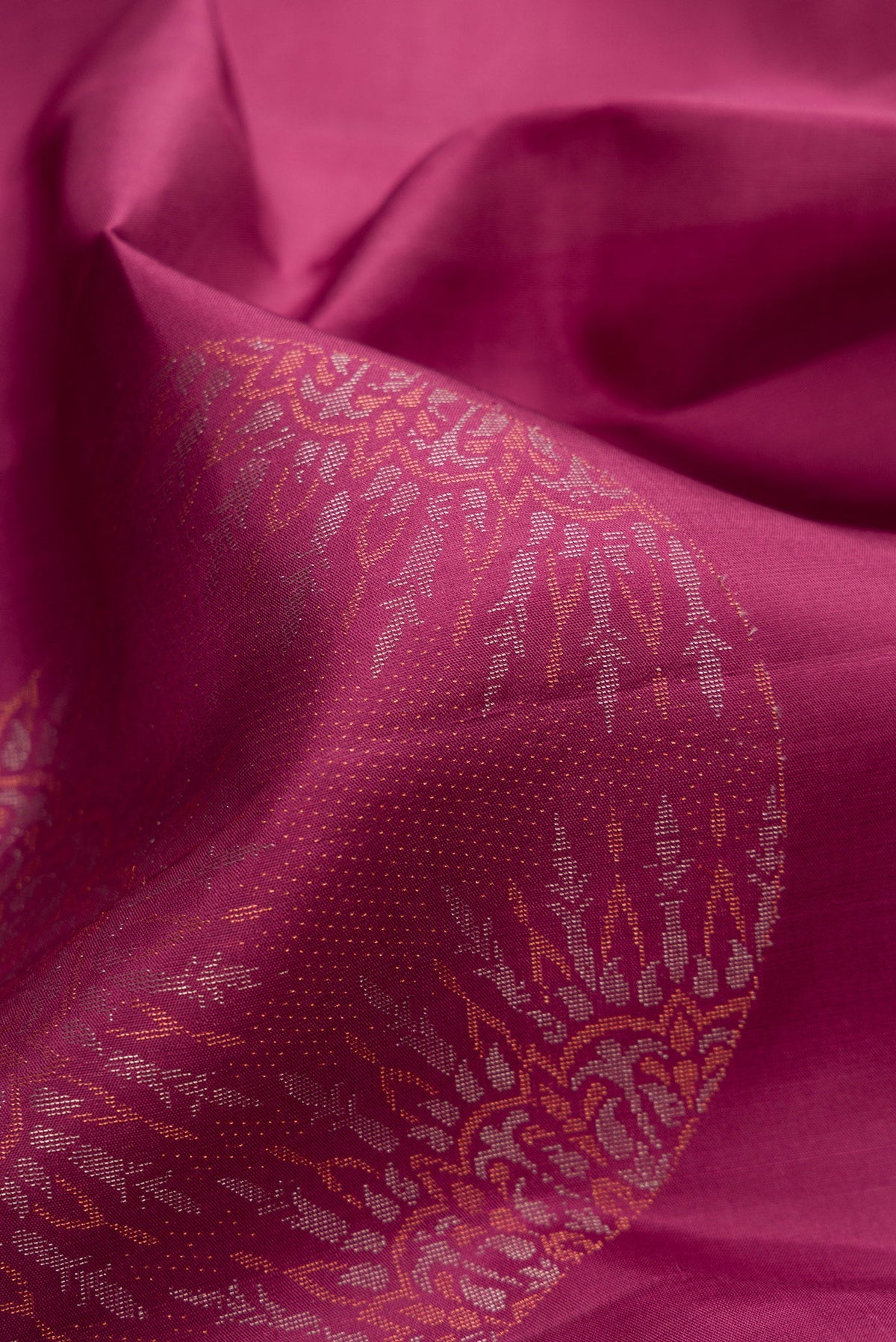 Close up of Mauve Soft Silk Saree with Zari Butta on the body and Without Border.  displaying folds
