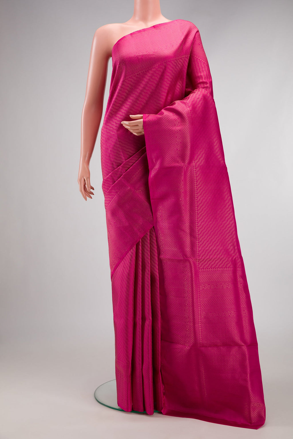 Pink Soft Silk Saree with Zari Brocade on the body and Fancy Border.  displayed on a mannequin