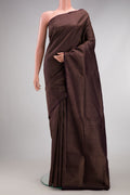 Burgundy Soft Silk Saree with Zari Brocade on the body and Fancy Border.  displayed on a mannequin