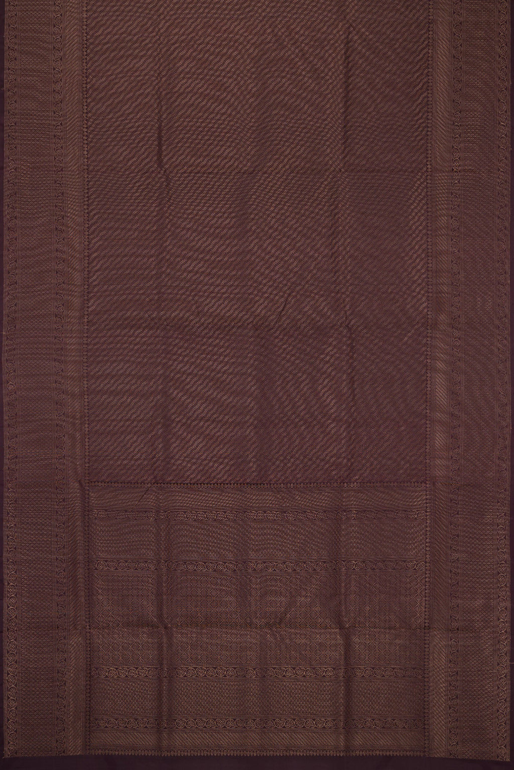 Flat view of Burgundy Soft Silk Saree with Zari Brocade on the body and Fancy Border. 