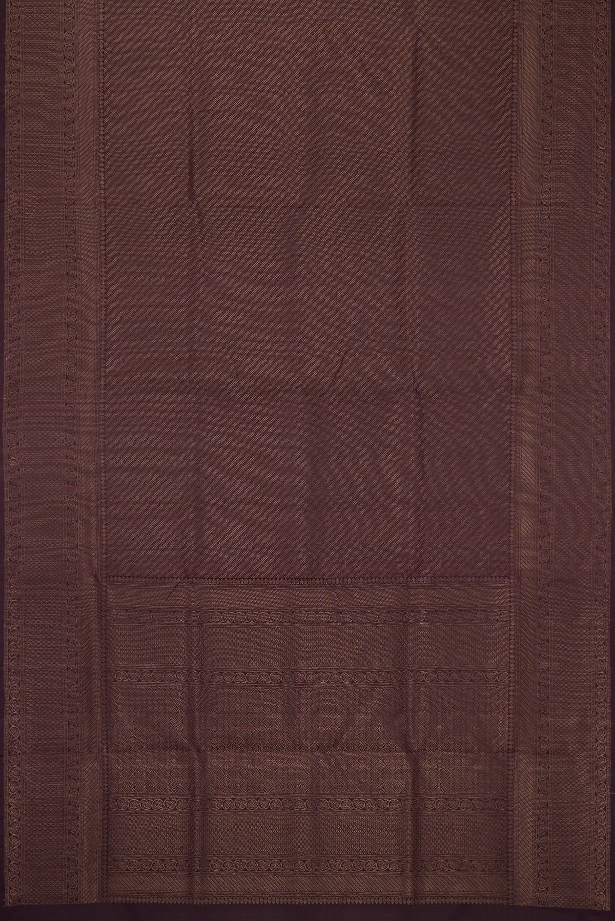 Flat view of Burgundy Soft Silk Saree with Zari Brocade on the body and Fancy Border. 