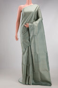 Light Blue Dual Tone Soft Silk Saree with Zari Brocade on the body and Fancy Border.  displayed on a mannequin