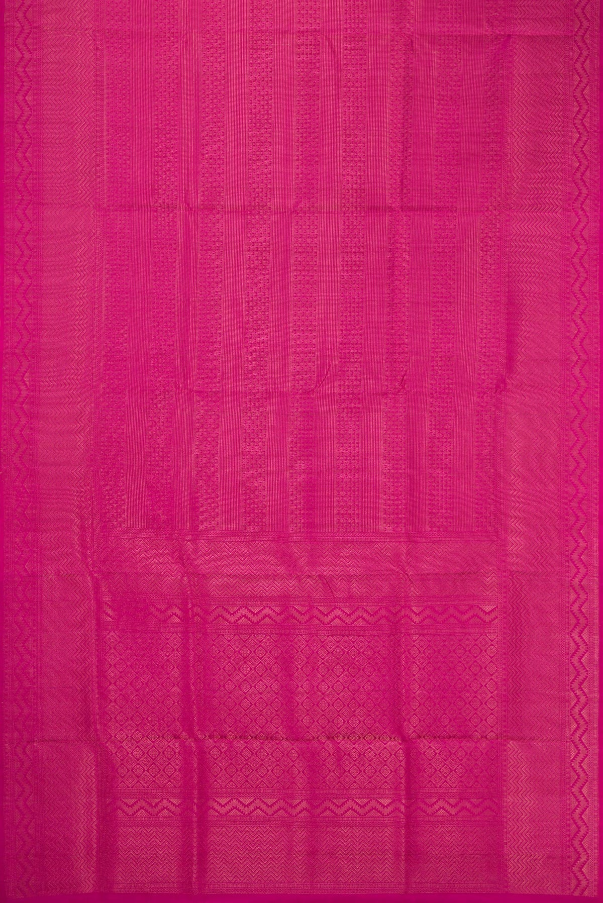 Flat view of Magenta Soft Silk Saree with Zari Brocade on the body and Fancy Border. 