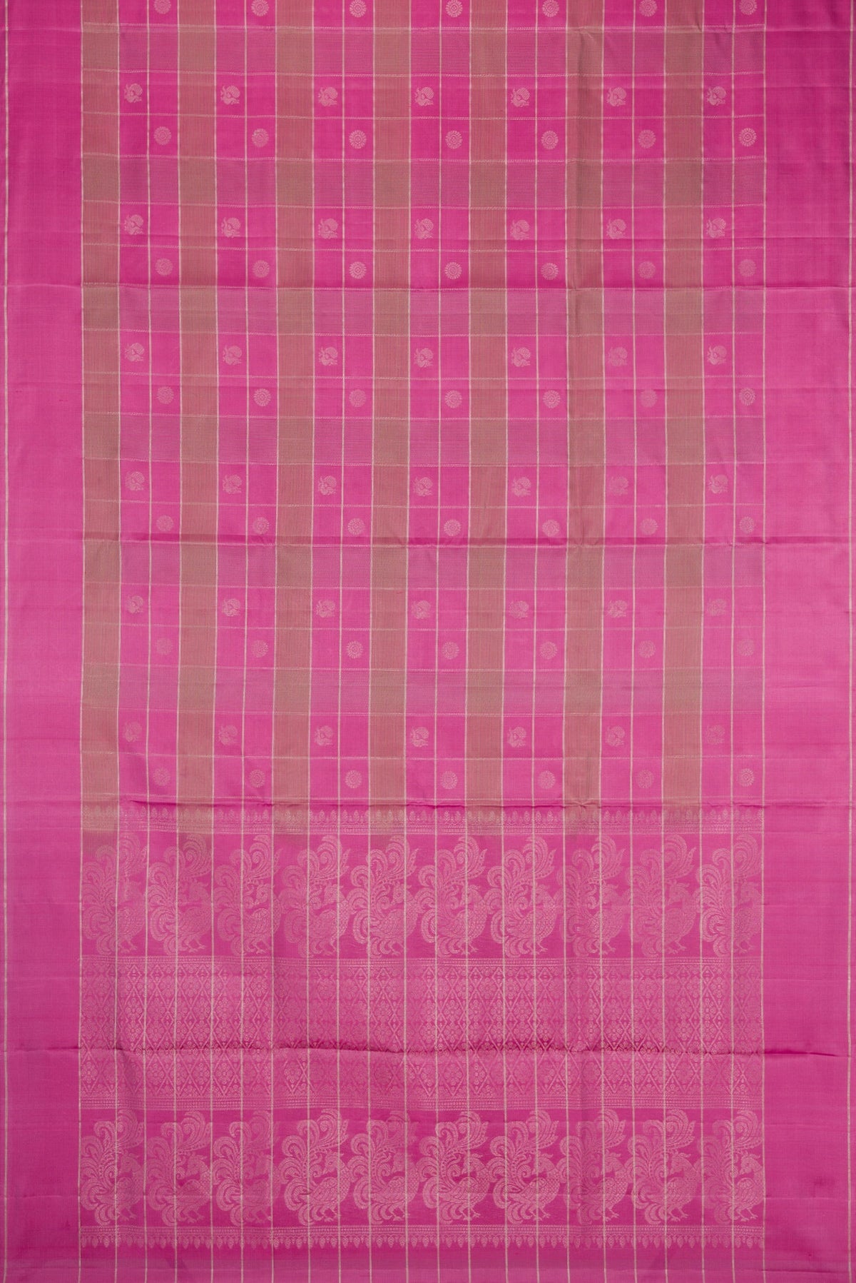 Flat view of Pink Soft Silk Saree with Checked design on the body and Plain Border. 