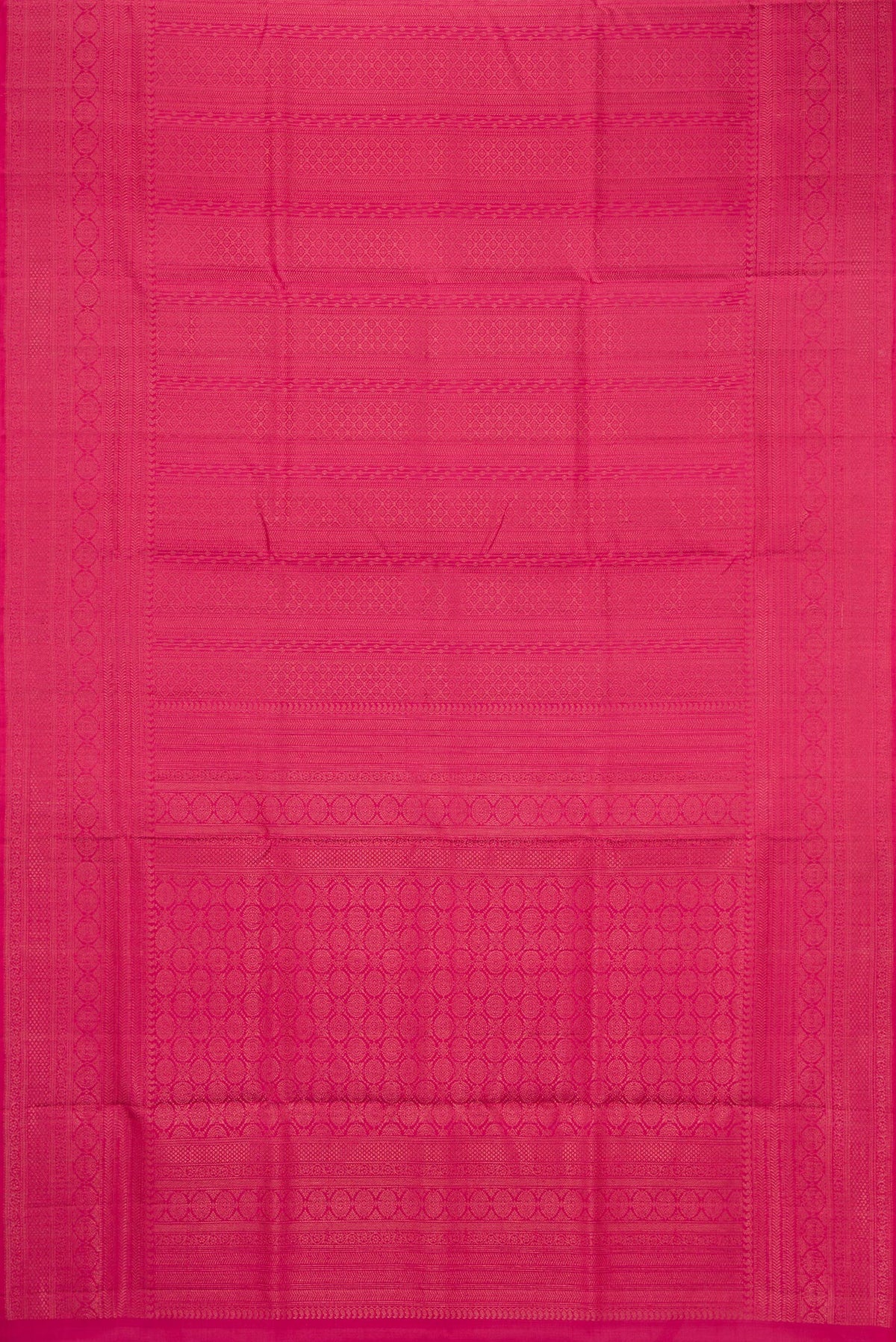 Flat view of Pink Soft Silk Saree with Zari Brocade on the body and Fancy Border. 