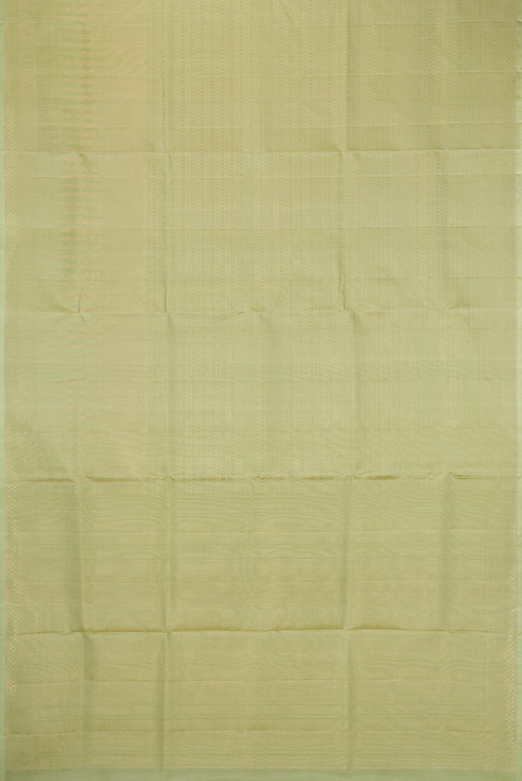 Flat view of Pista Green Soft Silk Saree with Zari Brocade on the body and Fancy Border. 