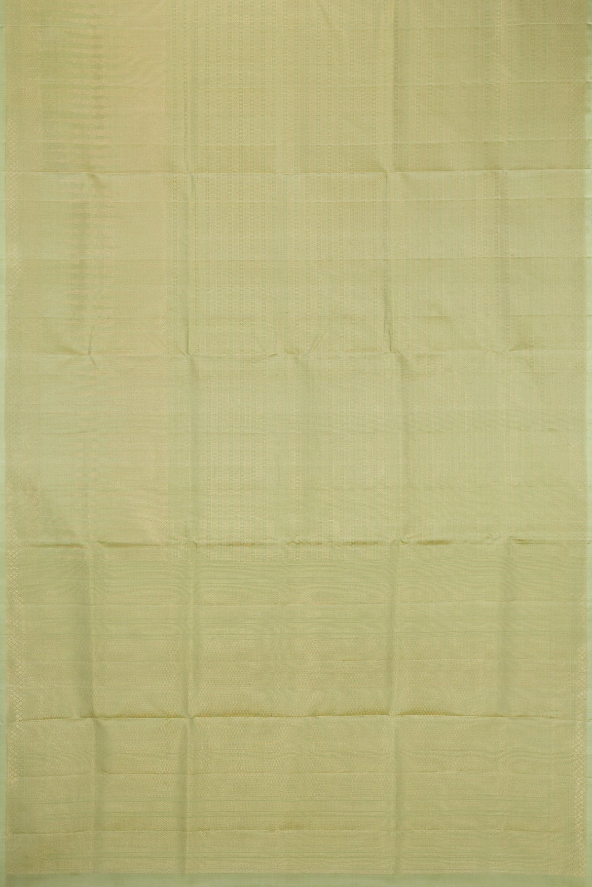 Flat view of Pista Green Soft Silk Saree with Zari Brocade on the body and Fancy Border. 