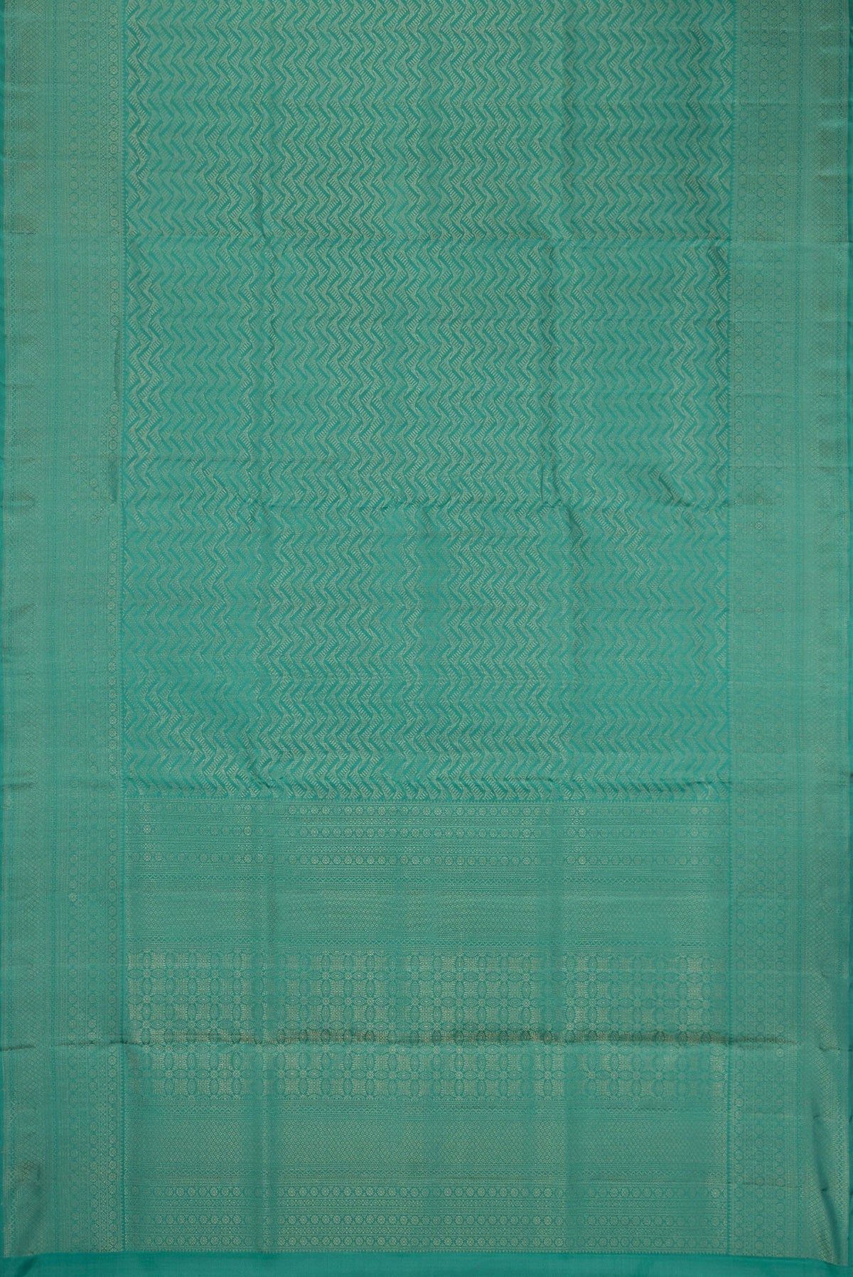 Flat view of Maya Blue Soft Silk Saree with Zari Brocade on the body and Fancy Border. 