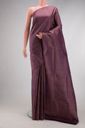 Purple Soft Silk Saree with Zari Brocade on the body and Fancy Border.  displayed on a mannequin