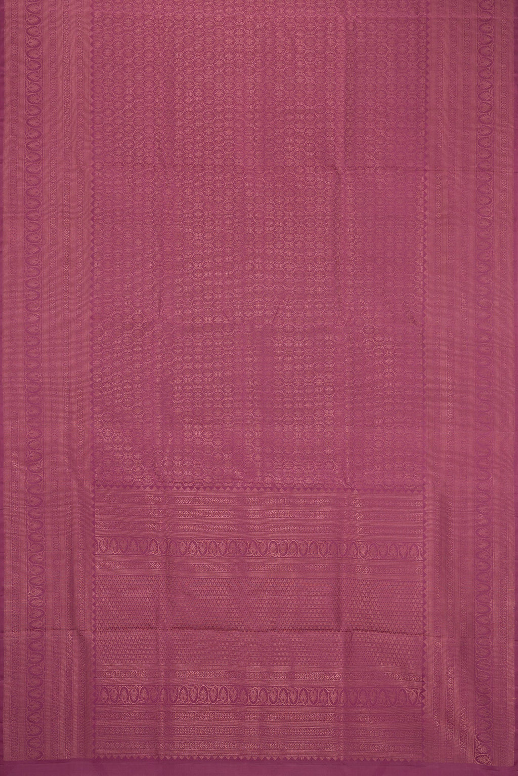 Flat view of Lavender Soft Silk Saree with Zari Brocade on the body and Fancy Border. 