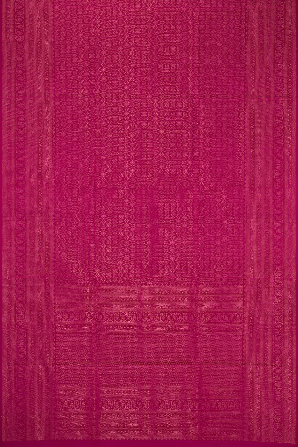 Flat view of Magenta Soft Silk Saree with Zari Brocade on the body and Fancy Border. 