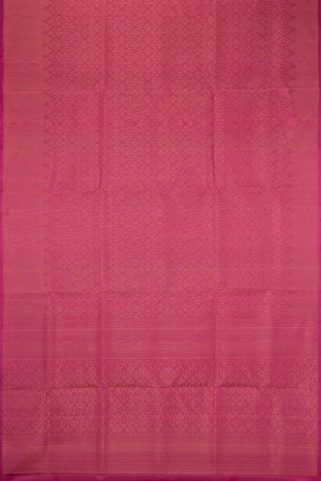 Flat view of Dark Pink Soft Silk Saree with Zari Brocade on the body and Fancy Border. 
