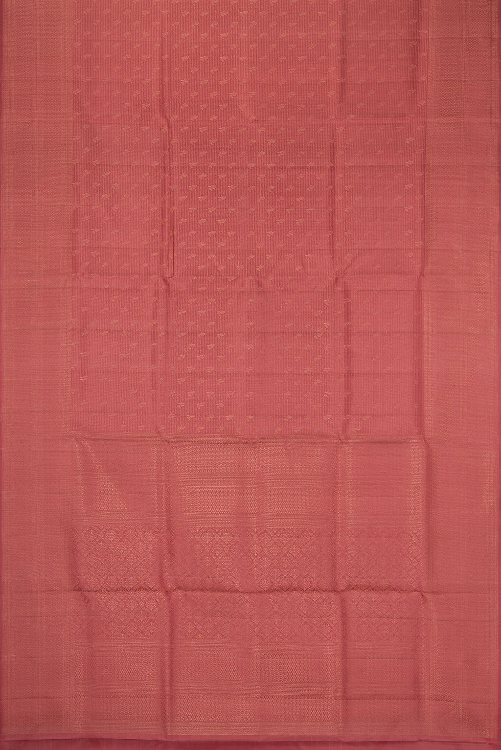 Flat view of Rose Gold Soft Silk Saree with Zari Brocade on the body and Fancy Border. 