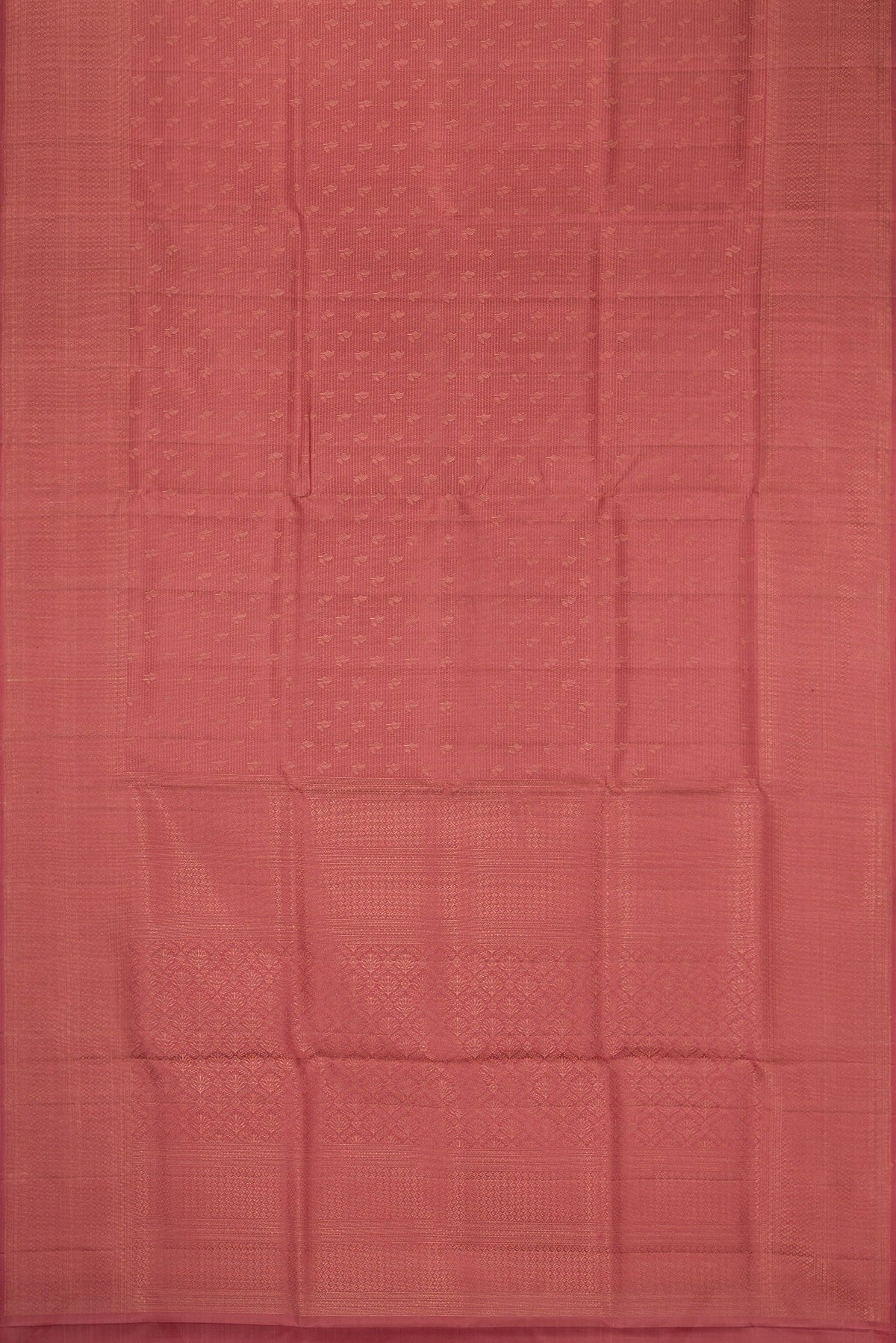 Flat view of Rose Gold Soft Silk Saree with Zari Brocade on the body and Fancy Border. 